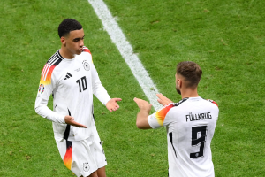 Substitute Niclas Fullkrug scored a late equaliser for Germany as they rescued a draw with Switzerland to top Group A.