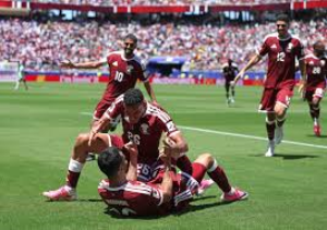Qatar scored a dramatic stoppage-time equaliser as they fought back to draw against Switzerland to claim their first-ever point at a World Cup finals.