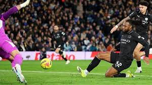 Antoine Semenyo scored just before half-time as title-chasing Manchester City escaped Elland Road with victory over an energetic Leeds United.