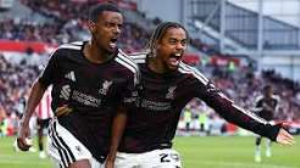 Liverpool staged a second-half fightback to come from behind and beat nine-man Brentford at the Gtech Community Stadium.