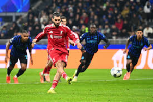 Dominik Szoboszlai's 88th-minute penalty gave Liverpool a crucial win against Inter Milan in the Champions League.