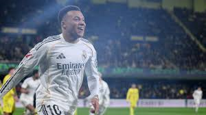 La Liga's dramatic title race took another turn as Real Madrid leapfrogged Barcelona into top spot with a 2-0 win against Villarreal.