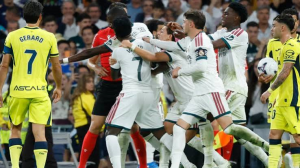 Substitute Vinicius Jr was dramatically sent off for pulling the hair of Nathan Saliba in Real Madrid's narrow win over Villarreal.