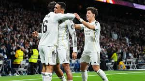 Trent Alexander-Arnold claimed an assist on his first start in more than two months as Real Madrid beat Real Sociedad to move top of La Liga.