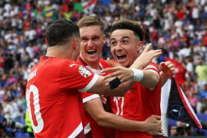 Switzerland are through to the quarter-finals after beating Italy 2-0 and will play the winner of the England-Slovakia match on July 6.