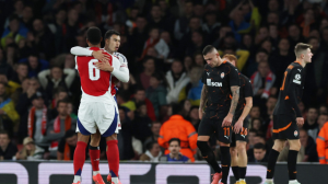 Arsenal beat Shakhtar Donetsk in the Champions League thanks to an own goal by goalkeeper Dmytro Riznyk as they bounced back from defeat by Bournemouth at the weekend.