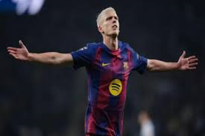 Barcelona moved seven points clear at the top of La Liga after Dani Olmo and Robert Lewandowski struck late against Espanyol.