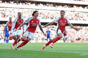 Arsenal scored twice in stoppage time to earn a dramatic victory over Leicester.