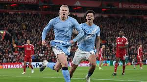 Erling Haaland scored a dramatic 93rd-minute penalty as Manchester City pulled off a stunning comeback against Liverpool to keep the Premier League title race alive.