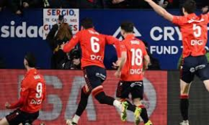 Vinicius Jr ended an emotional week with his fifth goal in four games, but was unable to prevent Real Madrid losing 2-1 to Osasuna and handing Barcelona the initiative in the La Liga title race.