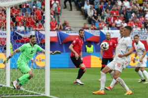 Substitute Saba Lobjanidze wasted a golden chance for Georgia with the final kick of the game as the debutants claimed a first ever point in a major tournament with a 1-1 draw against the Czech Republic.